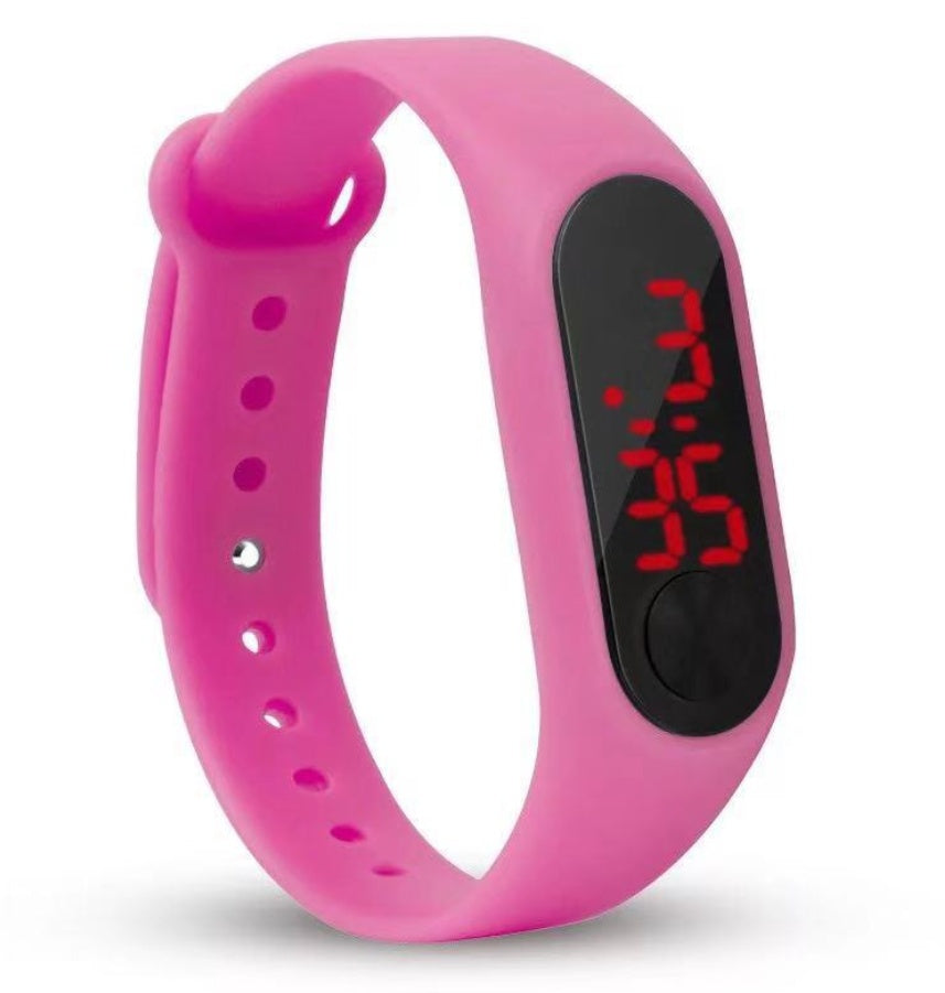 Pink digital watch with a black screen on a white background