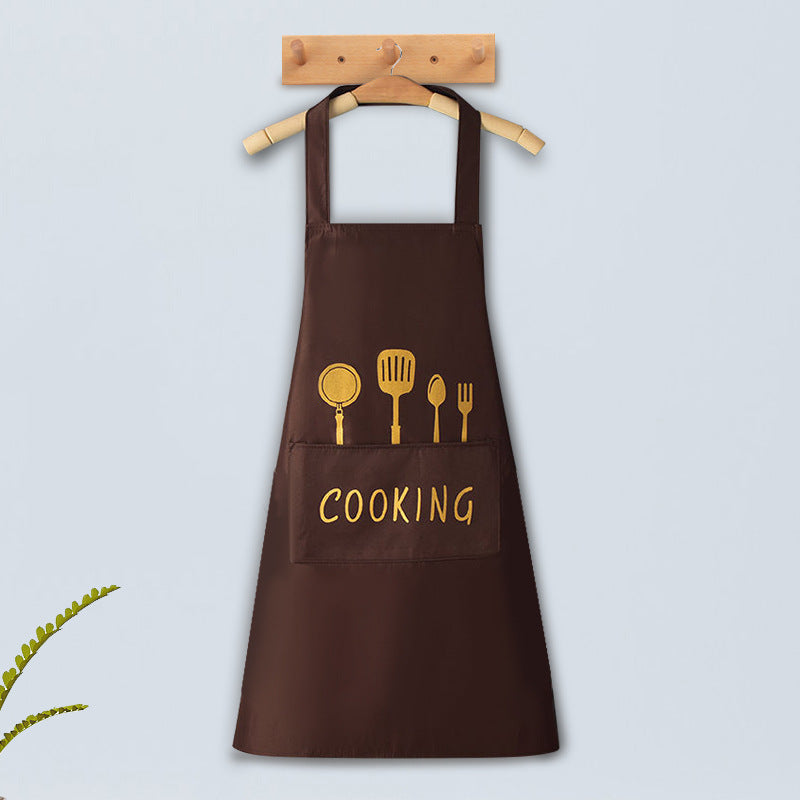 Brown apron with gold utensil icons and 'COOKING' text on a light blue background