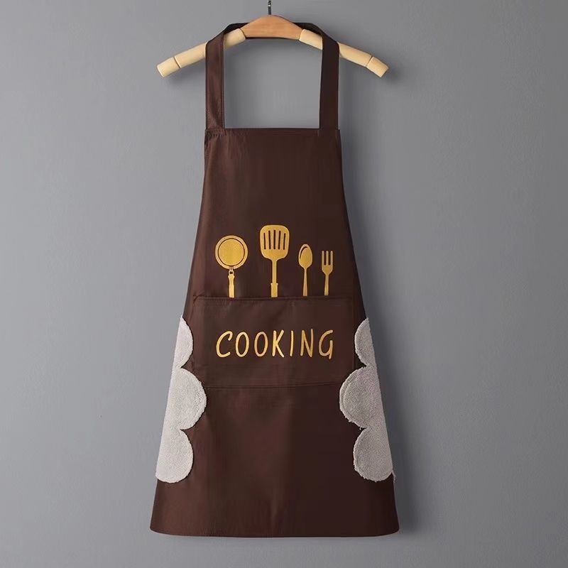 Brown apron with yellow cooking utensil icons and 'COOKING' text on a gray background