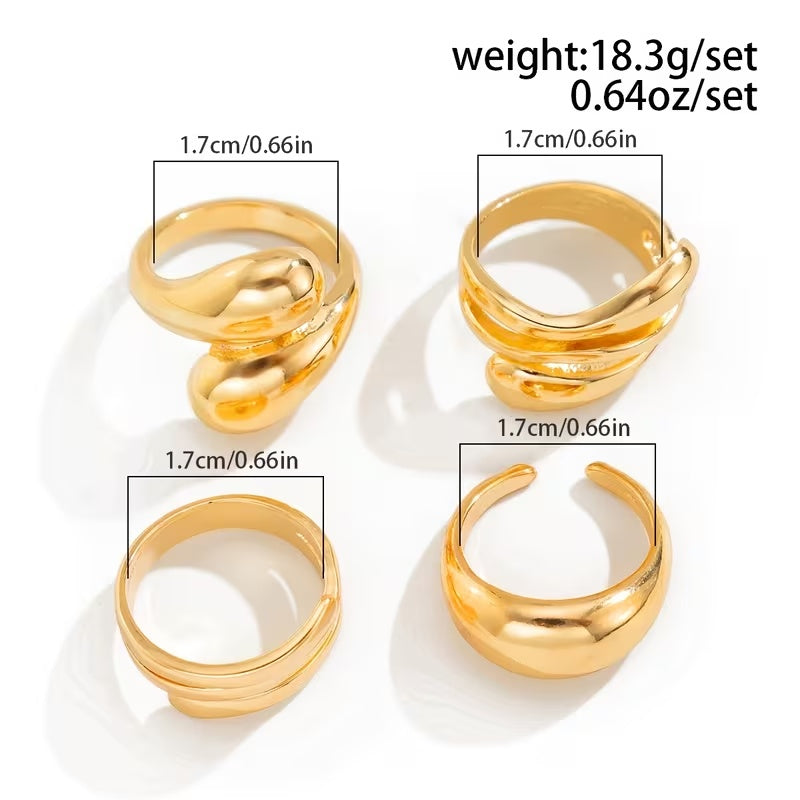 Set of gold rings with measurements and weight information on a white background