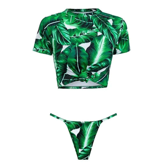 Green leaf-patterned bikini set on a white background