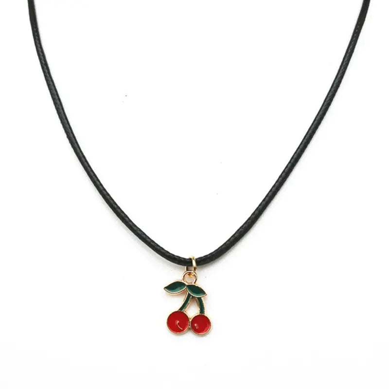 Necklace with cherry pendant on a white background