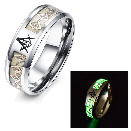 Silver ring with Masonic symbols and a green glow-in-the-dark feature.