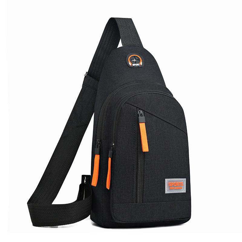 Black sling bag with orange accents on a white background