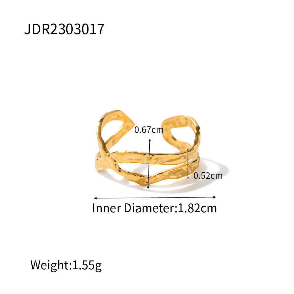 Gold ring with measurements on a white background