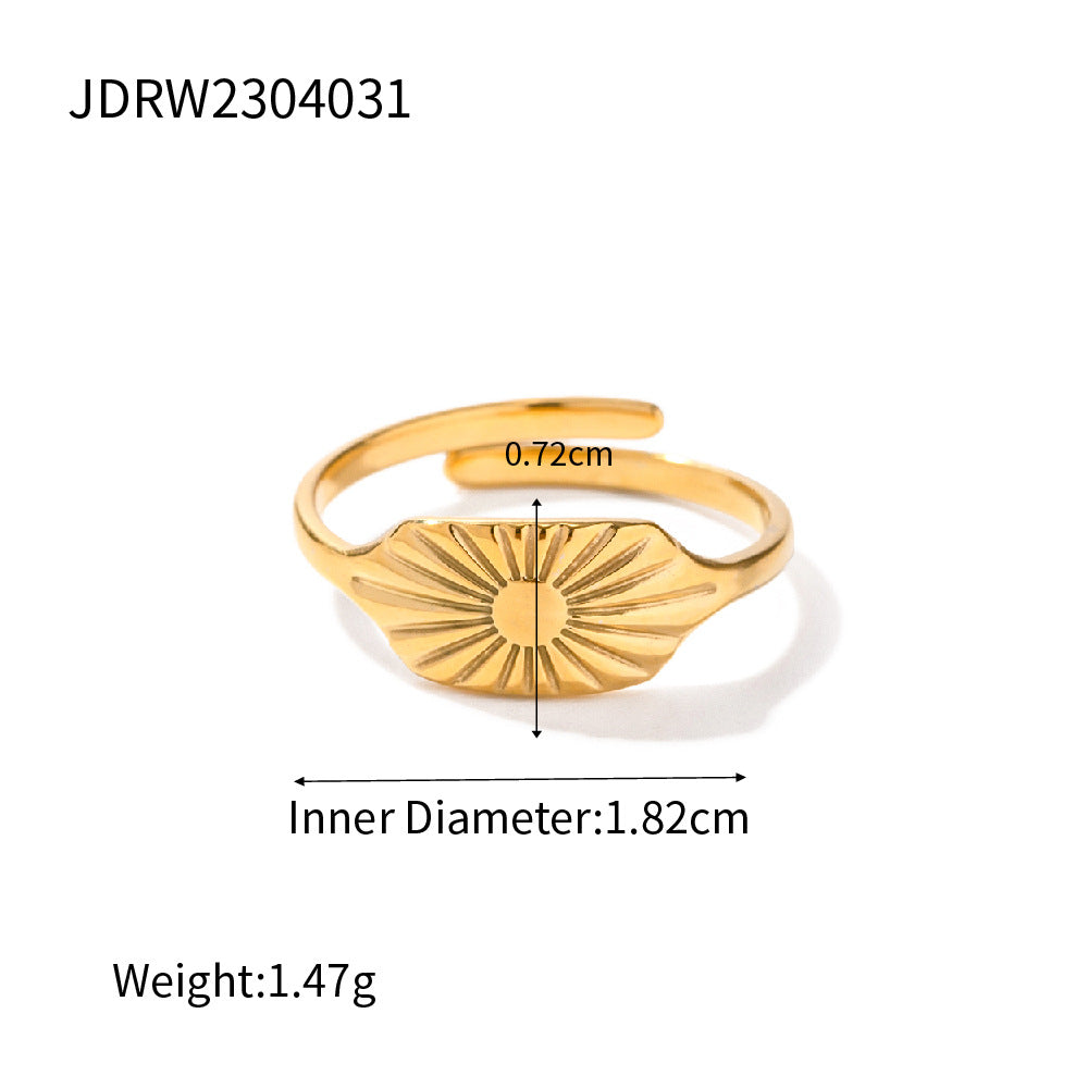 Gold bracelet with measurements on a white background