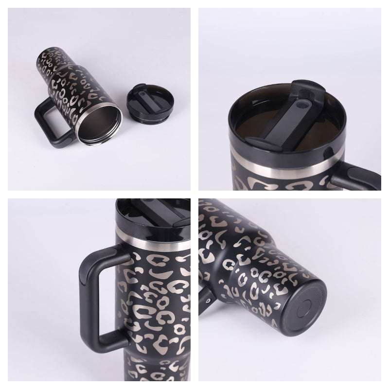 Leopard print travel mug with handle and lid on a white background