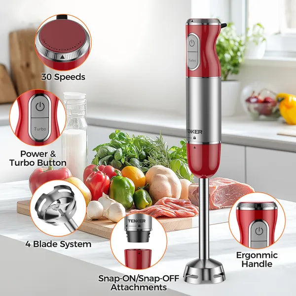 Red and silver immersion blender on a kitchen counter with various ingredients and features highlighted.
