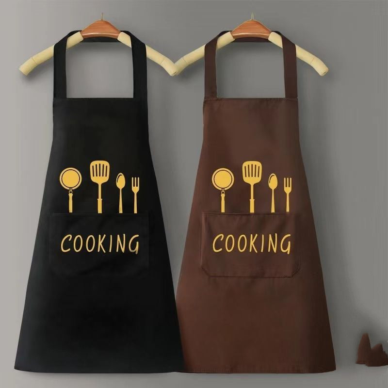 Black and brown aprons with 'COOKING' text and utensil icons on a gray background