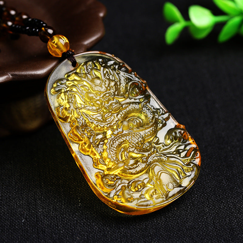 Dragon pendant necklace on a dark background