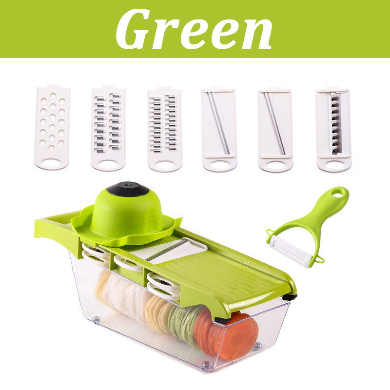 Green vegetable chopper with multiple attachments on a white background