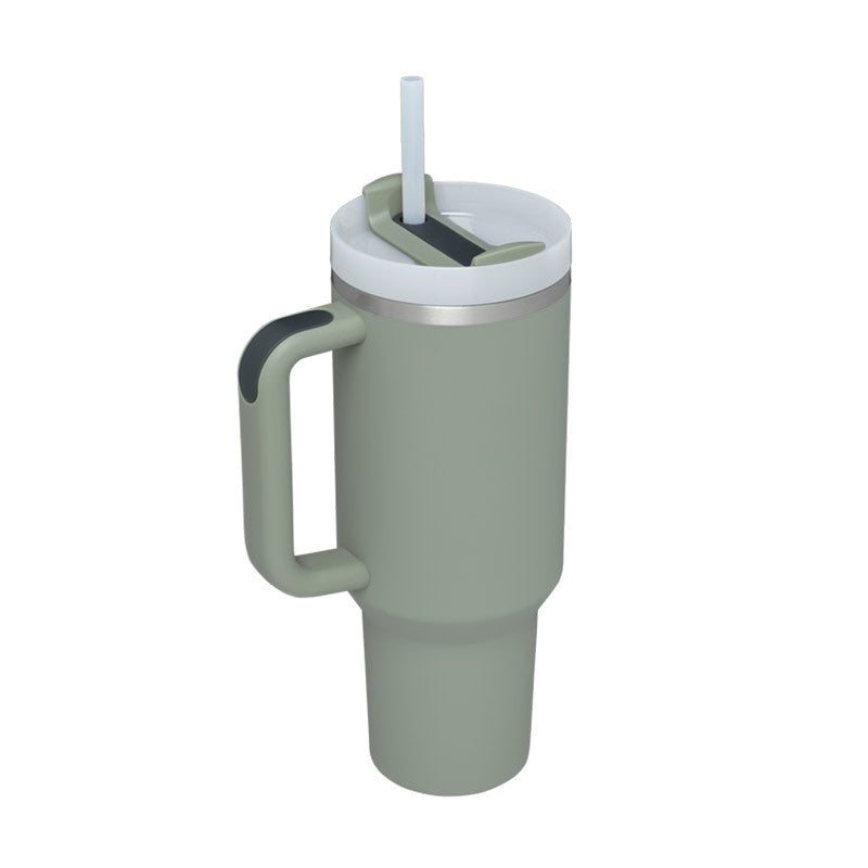 Green insulated mug with handle and straw lid on a white background