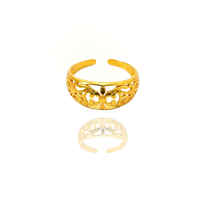 Gold open ring with intricate design on a white background