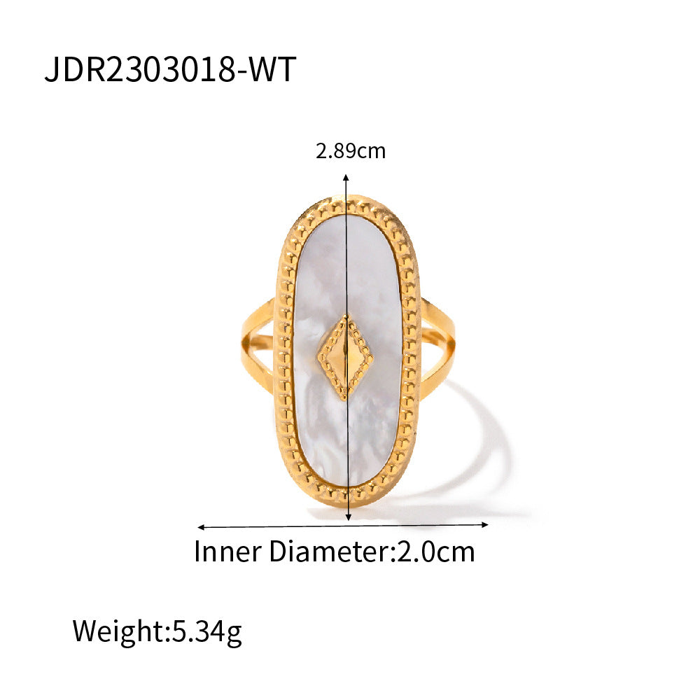 Gold ring with a central stone, showing measurements on a white background.