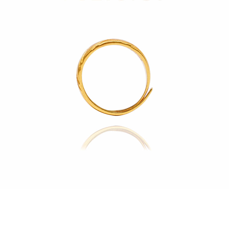 Gold hoop earring on a white background