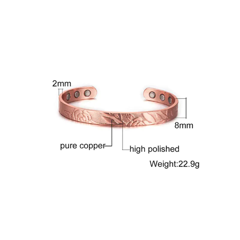 Copper bracelet with measurements and details on a white background