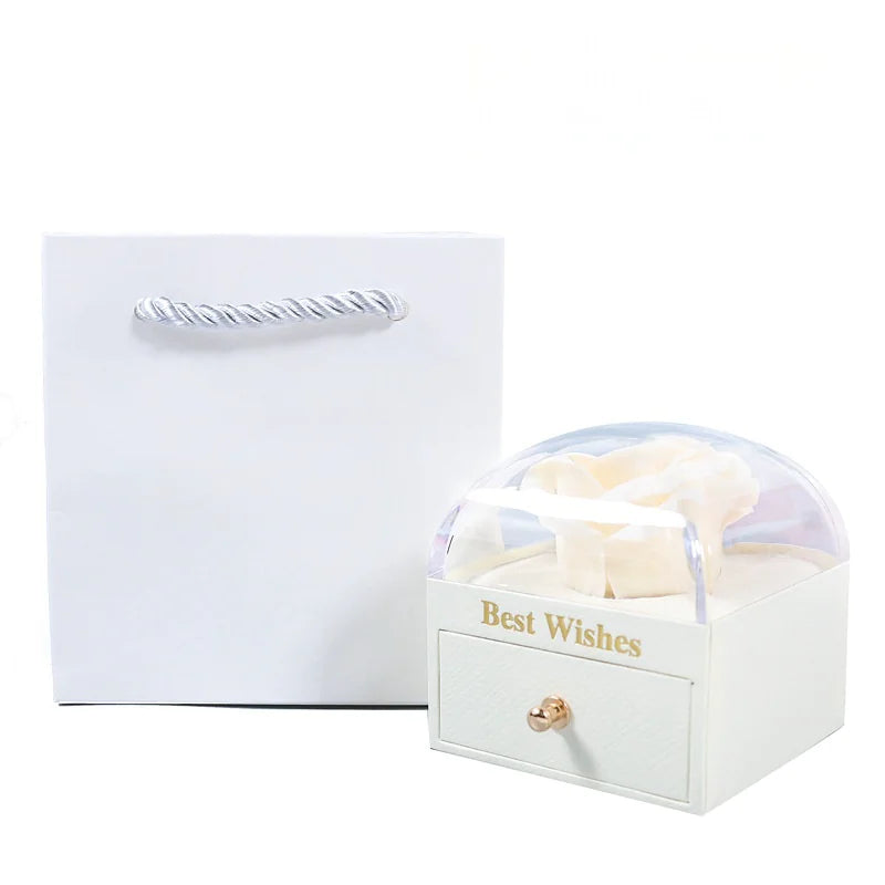 White jewelry box with 'Best Wishes' text on a white background