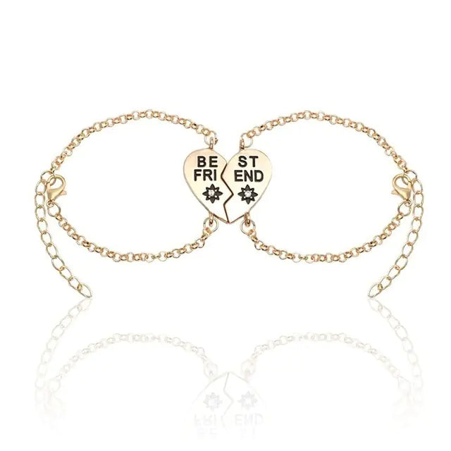 Gold bracelet with heart-shaped charms displaying 'BFF' on a white background