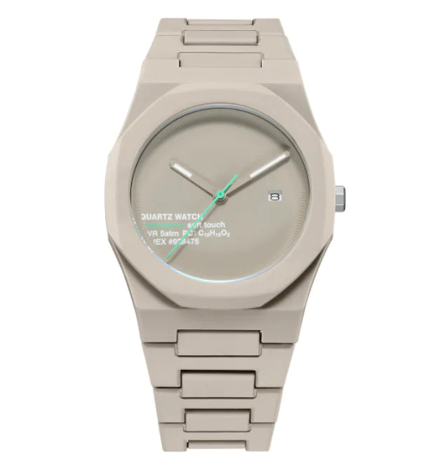 Beige watch with metallic band on a white background