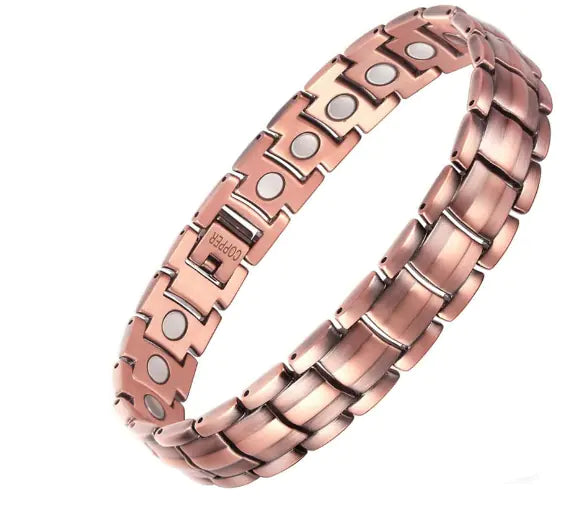 Rose gold bracelet with magnetic properties on a white background